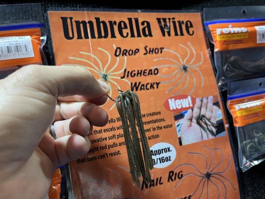 Soft Lures: Reins Umbrella Wire
The soft bait category was full of the normal soft plastics we have all used for years, but there was also a heavy JDM influence with dice-style lures and unique baits for mid-strolling. One other unique offering was the Reins Umbrella Wire.
This bait looks like a gob of nightcrawlers on a hook, with many different arms and appendances all coming from one center piece. The bait can be fished in a number of ways, including on a drop-shot or wacky rig.
The video of this bait in action is truly unique and it has a great undulating action as it comes through the water. It was cool to see in your hands,&nbsp; but looks even better in the water and shows the bass something very unique.
&nbsp;